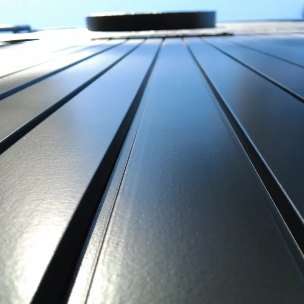 A close-up of vertical cladding following Weathershield® ColourGuardTM Rawene painting.